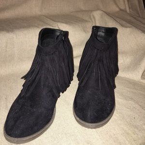 Black low heeled booties with fringe